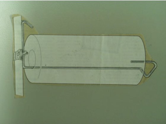 Repusel kitchen roll holder for tent or awning pole